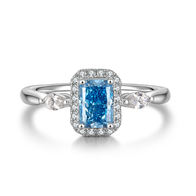 Radiant Cut Blue Diamond Ring with Pear-Shaped Accents