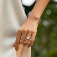 PT950 Platinum Diamond Ring with Three-Stone Design & Pear-Cut Accents