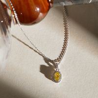 Oval Yellow Diamond Halo Necklace in 950 Platinum (0.62 ct.)